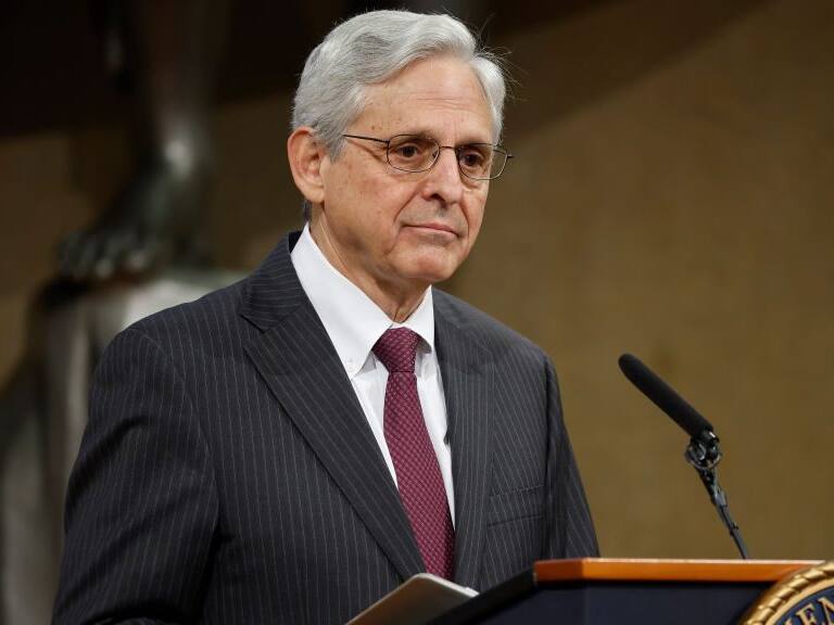 WASHINGTON, DC - MAY 20: U.S. Attorney General Merrick Garland delivers remarks during an event to mark the first anniversary of the COVID-19 Hate Crimes Act at the Department of Justice Robert F. Kennedy Building on May 20, 2022 in Washington, DC. Noting that 10 Black people were murdered as they shopped for groceries in a racist massacre on May 14th in Buffalo, New York. The Biden Administration officials announced a series of policy initiatives to help deter and confront hate crimes and other bias-related incidents. (Photo by Chip Somodevilla/Getty Images)