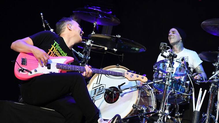 INGLEWOOD, CALIFORNIA - JANUARY 18: (FOR EDITORIAL USE ONLY) (L-R) Mark Hoppus and Travis Barker of blink-182 perform onstage at the 2020 iHeartRadio ALTer EGO at The Forum on January 18, 2020 in Inglewood, California. (Photo by Jeff Kravitz/FilmMagic for iHeartMedia )