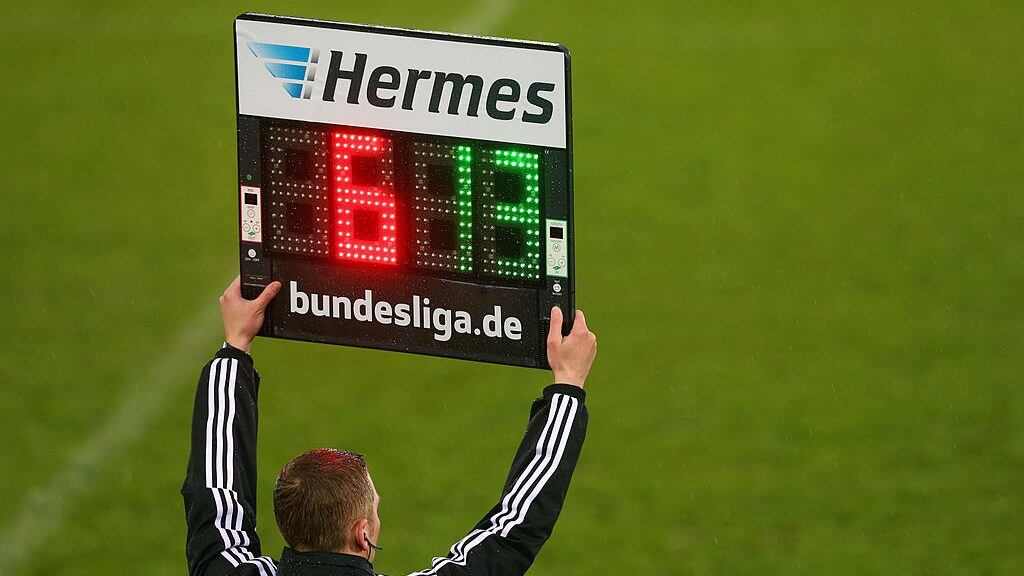 REGENSBURG, GERMANY - APRIL 19:  The 4th official referee holds the referee board with substitution numbers during the Second Bundesligamatch between Jahn Regensburg and FC Ingolstadt at Jahnstadion on April 19, 2013 in Regensburg, Germany.  (Photo by Alexander Hassenstein/Bongarts/Getty Images)