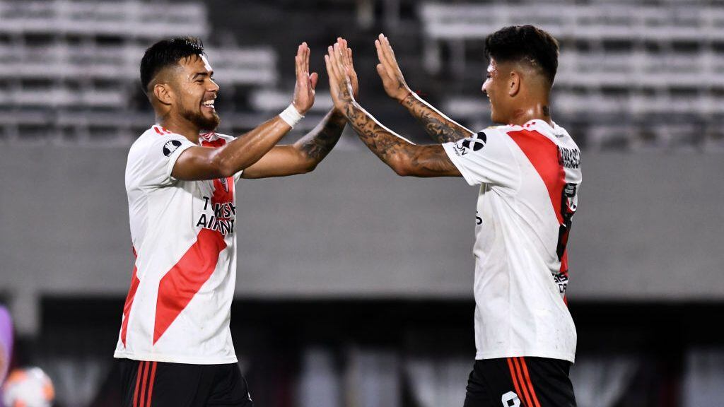 BUENOS AIRES, ARGENTINA - MARCH 11: Paulo Diaz of River Plate celebrates with teammate Jorge Carrascal after scoring the sixth goal of his team during a Group D match between River Plate and Deportivo Binacional as part of Copa CONMEBOL Libertadores 2020 at Estadio Monumental Antonio Vespucio Liberti on March 11, 2020 in Buenos Aires, Argentina. (Photo by Rodrigo Valle/Getty Images)