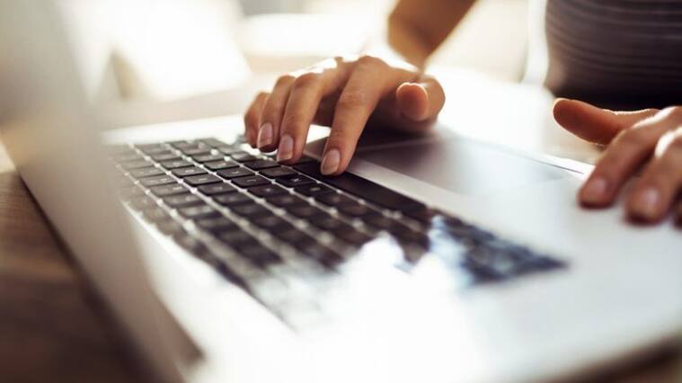 Close up of a young woman working from home