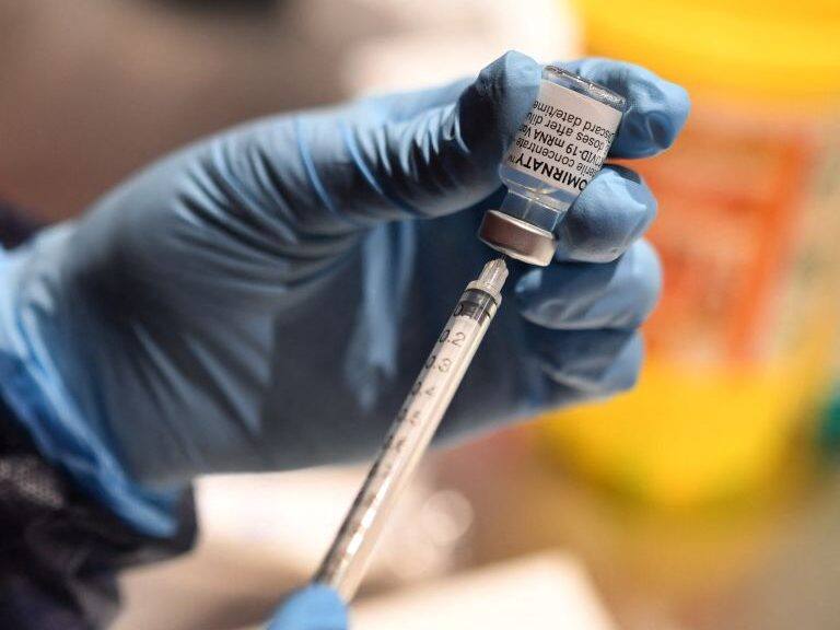 A nurse prepares a syringe with a dose of the Pfizer-BioNtech Covid-19 vaccine, at a vaccination centre in Quimper, western France, on April 30, 2021. (Photo by Fred TANNEAU / AFP) (Photo by FRED TANNEAU/AFP via Getty Images)