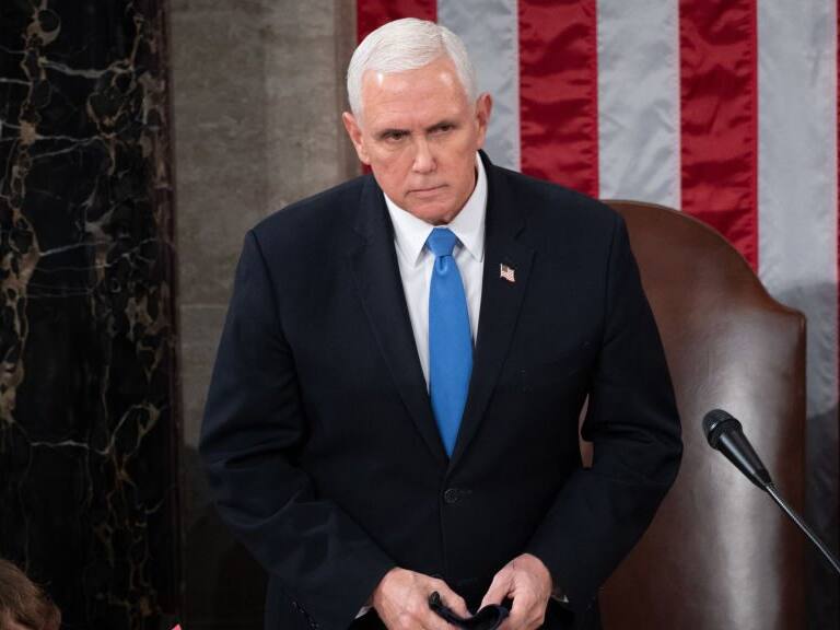 US Vice President Mike Pence presides over a joint session of Congress to count the electoral votes for President at the US Capitol in Washington, DC, January 6, 2021. - Congress is meeting to certify Joe Biden as the winner of the 2020 presidential election, with scores of Republican lawmakers preparing to challenge the tally in a number of states during what is normally a largely ceremonial event. (Photo by SAUL LOEB / POOL / AFP) (Photo by SAUL LOEB/POOL/AFP via Getty Images)