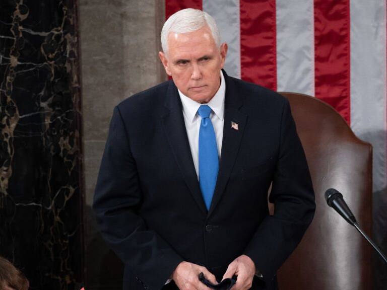US Vice President Mike Pence presides over a joint session of Congress to count the electoral votes for President at the US Capitol in Washington, DC, January 6, 2021. - Congress is meeting to certify Joe Biden as the winner of the 2020 presidential election, with scores of Republican lawmakers preparing to challenge the tally in a number of states during what is normally a largely ceremonial event. (Photo by SAUL LOEB / POOL / AFP) (Photo by SAUL LOEB/POOL/AFP via Getty Images)