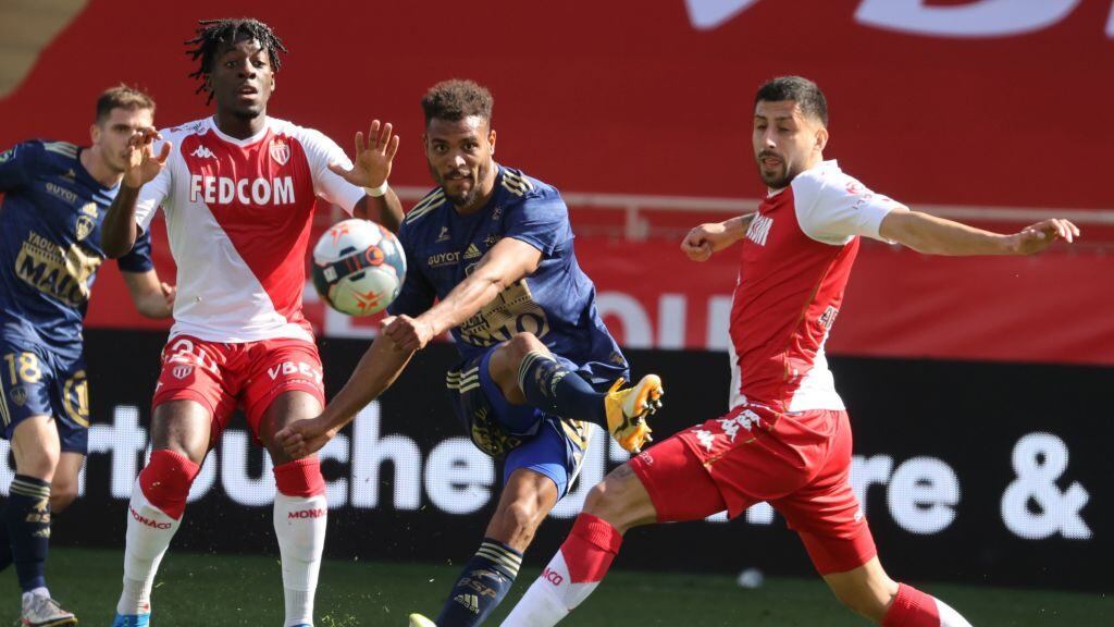 Brest's Beninese forward Steve Mounie (C) fights for the ball with Monaco's French defender Axel Disasi (L) and Monaco's Chilean defender Guillermo Maripan (R) during the French L1 football match between AS Monaco and Stade Brestois 29 at the "Louis II Stadium" in Monaco on February 28, 2021. (Photo by Valery HACHE / AFP) (Photo by VALERY HACHE/AFP via Getty Images)