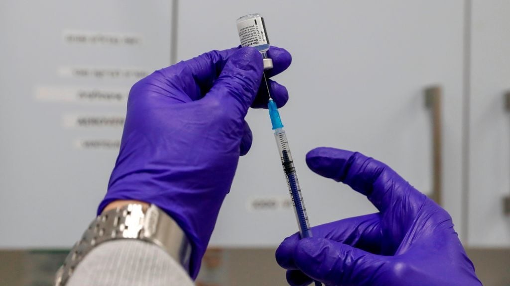 A health worker prepares a dose of the Pfizer-BioNtech COVID-19 vaccine at the Clalit Health Services in the Palestinian neighbourhood of Beit Hanina, in the Israeli-annexed east Jerusalem on March 2, 2021. (Photo by AHMAD GHARABLI / AFP) / The erroneous mention[s] appearing in the metadata of this photo by AHMAD GHARABLI has been modified in AFP systems in the following manner: [March 2] instead of [March 3]. Please immediately remove the erroneous mention from all your online services and delete it from your servers. If you have been authorized by AFP to distribute it to third parties, please ensure that the same actions are carried out by them. Failure to promptly comply with these instructions will entail liability on your part for any continued or post notification usage. Therefore we thank you very much for all your attention and prompt action. We are sorry for the inconvenience this notification may cause and remain at your disposal for any further information you may require. (Photo by AHMAD GHARABLI/AFP via Getty Images)
