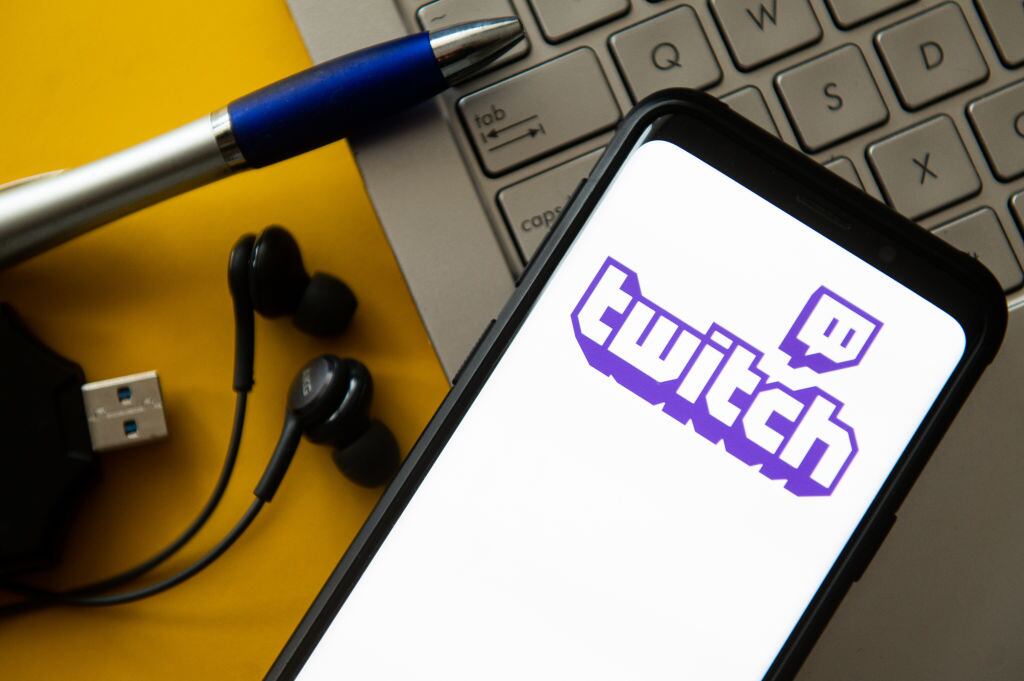 POLAND - 2020/10/20: In this photo illustration a Twitch logo seen displayed on a smartphone. (Photo Illustration by Mateusz Slodkowski/SOPA Images/LightRocket via Getty Images)