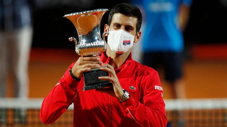 ROME, ITALY - SEPTEMBER 21: Novak Djokovic of Serbia lifts the trophy after winning his men's final match against Diego Schwartzman of Argentina during day eight of the Internazionali BNL d'Italia at Foro Italico on September 21, 2020 in Rome, Italy. (Photo by Clive Brunskill/Getty Images)