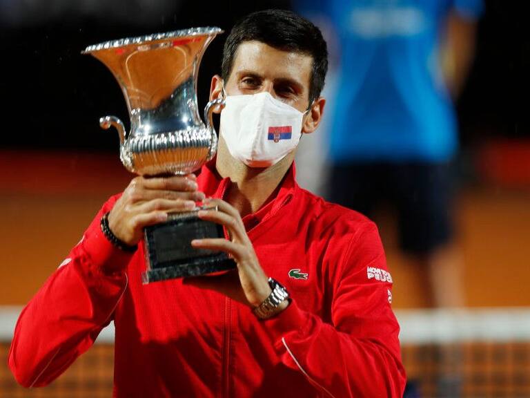 ROME, ITALY - SEPTEMBER 21: Novak Djokovic of Serbia lifts the trophy after winning his men&#039;s final match against Diego Schwartzman of Argentina during day eight of the Internazionali BNL d&#039;Italia at Foro Italico on September 21, 2020 in Rome, Italy. (Photo by Clive Brunskill/Getty Images)