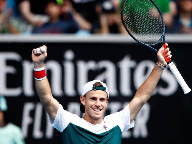 MELBOURNE, AUSTRALIA - JANUARY 24: Diego Schwartzman of Argentina celebrates after winning match point during his Men's Singles third round match against Dusan Lajovic of Serbia on day five of the 2020 Australian Open at Melbourne Park on January 24, 2020 in Melbourne, Australia. (Photo by Daniel Pockett/Getty Images)