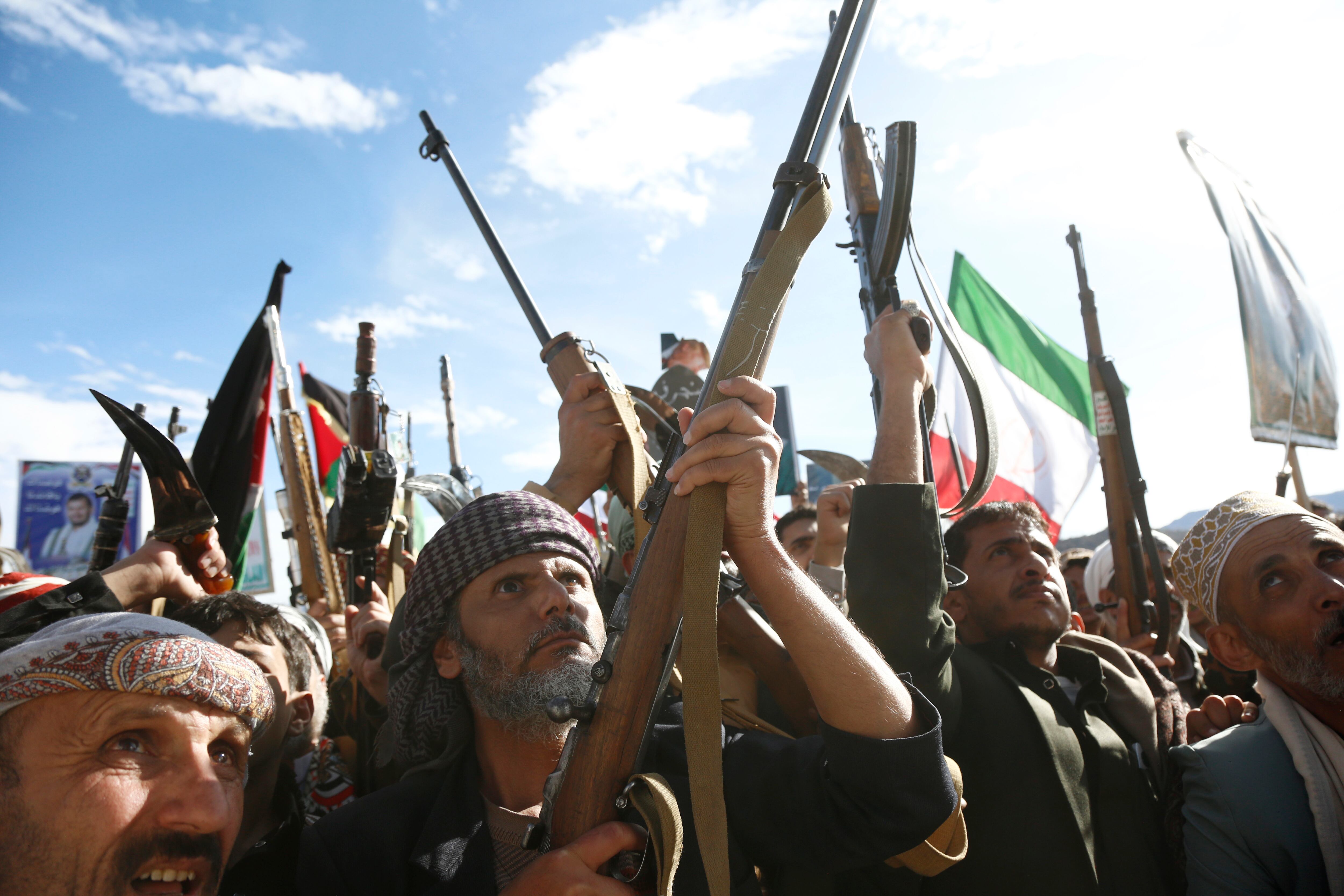 SANA'A, YEMEN - MARCH 27: Yemen's Houthi loyalists chant slogans as they participate in a protest staged to show support to Iran against the U.S.-Israel war on March 27, 2026 in Sana'a, Yemen. (Photo by Mohammed Hamoud/Getty Images)