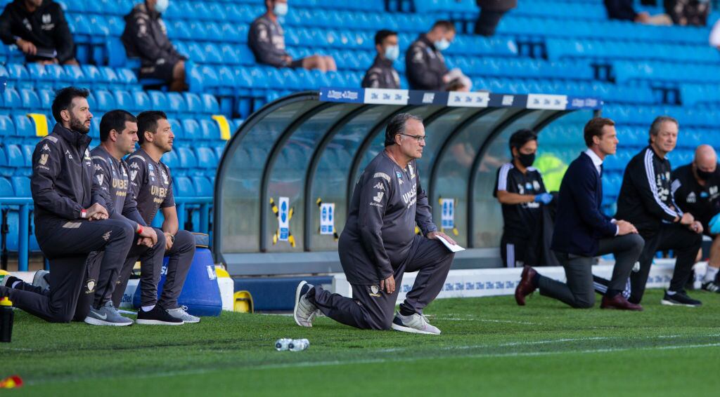 LEEDS, ENGLAND - JUNE 27: Leeds United manager Marcelo Bielsa takes the knee during the Sky Bet Championship match between Leeds United and Fulham at Elland Road on June 27, 2020 in Leeds, England. (Photo by Alex Dodd - CameraSport via Getty Images)
