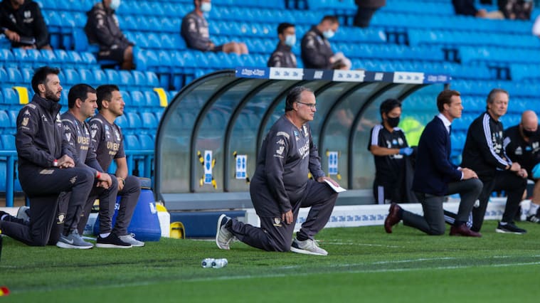 LEEDS, ENGLAND - JUNE 27: Leeds United manager Marcelo Bielsa takes the knee during the Sky Bet Championship match between Leeds United and Fulham at Elland Road on June 27, 2020 in Leeds, England. (Photo by Alex Dodd - CameraSport via Getty Images)