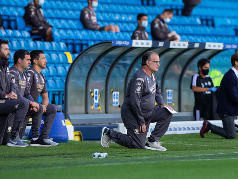 LEEDS, ENGLAND - JUNE 27: Leeds United manager Marcelo Bielsa takes the knee during the Sky Bet Championship match between Leeds United and Fulham at Elland Road on June 27, 2020 in Leeds, England. (Photo by Alex Dodd - CameraSport via Getty Images)
