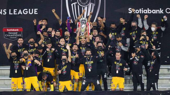 ORLANDO, FL - DECEMBER 22: Tigres players celebrate after winning the Concacaf Championship between LAFC and Tigres UANL on December 22, 2020, at Exploria Stadium in Orlando, FL. (Photo by Joe Petro/Icon Sportswire via Getty Images)