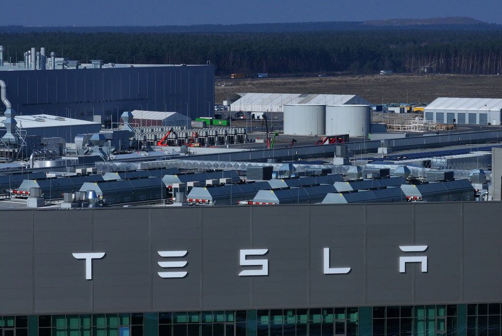 GRUENHEIDE, GERMANY - MARCH 07: In this aerial view the Tesla Gigafactory stands on March 07, 2024 near Gruenheide, Germany. Tesla has announced that it is suspending production at the Gruenheide factory until the end of next week due to the recent sabotage of an electricity pylon that is connected to the plant. A leftist activists association called the "Vulkan Group" ("Vulkangruppe") has claimed responsibility for the sabotage. (Photo by Sean Gallup/Getty Images)
