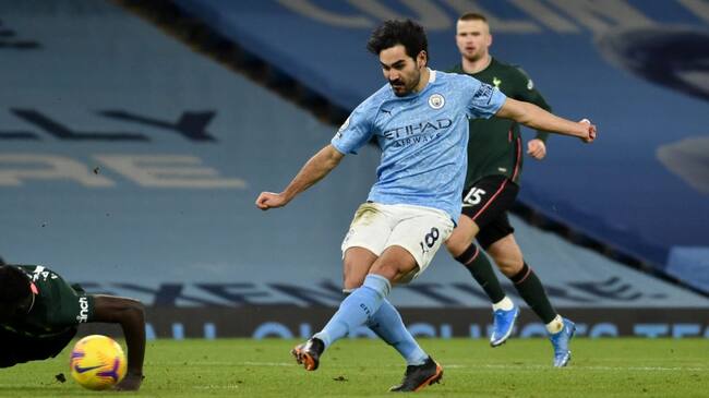 Manchester City's Ilkay Gundogan scores their third goal of the game during the Premier League match at the Etihad Stadium, Manchester. Picture date: Saturday February 13, 2021. (Photo by Rui Vieira/PA Images via Getty Images)