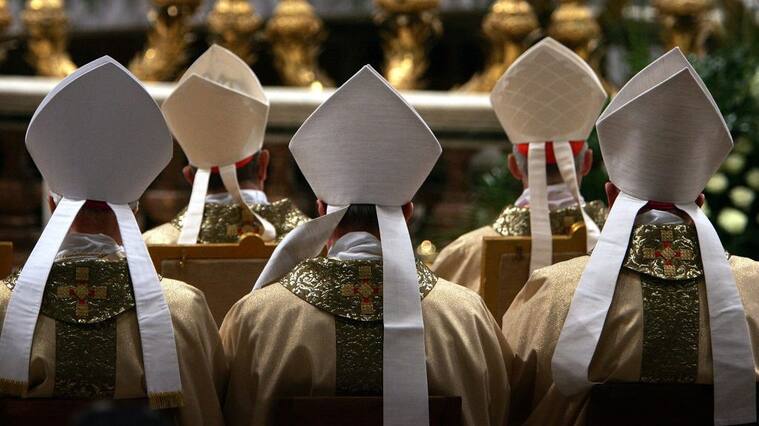 VATICAN CITY - MARCH 24: Cardinals face the altar as Colombian Cardinal Alfonso Lopez Trujillo gives the Mass of The Lords Supper in St Peter's Basilica March 24, 2005 in Vatican City. Presiding over the solemn Mass of the Last Supper, Cardinal Alfonso Lopez Trujillo relayed a message from the absent and frail Pope John Paul II "In mind and in heart I am close to you" The Pope said. (Photo by Christopher Furlong/Getty Images)