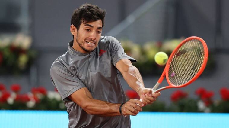 MADRID, SPAIN - MAY 07: Cristian Garín of Chile plays a backhand shot during their Quarter Final match against Matteo Berrettini of Italy during Day Nine of the Mutua Madrid Open at La Caja Magica on May 07, 2021 in Madrid, Spain. (Photo by Clive Brunskill/Getty Images)