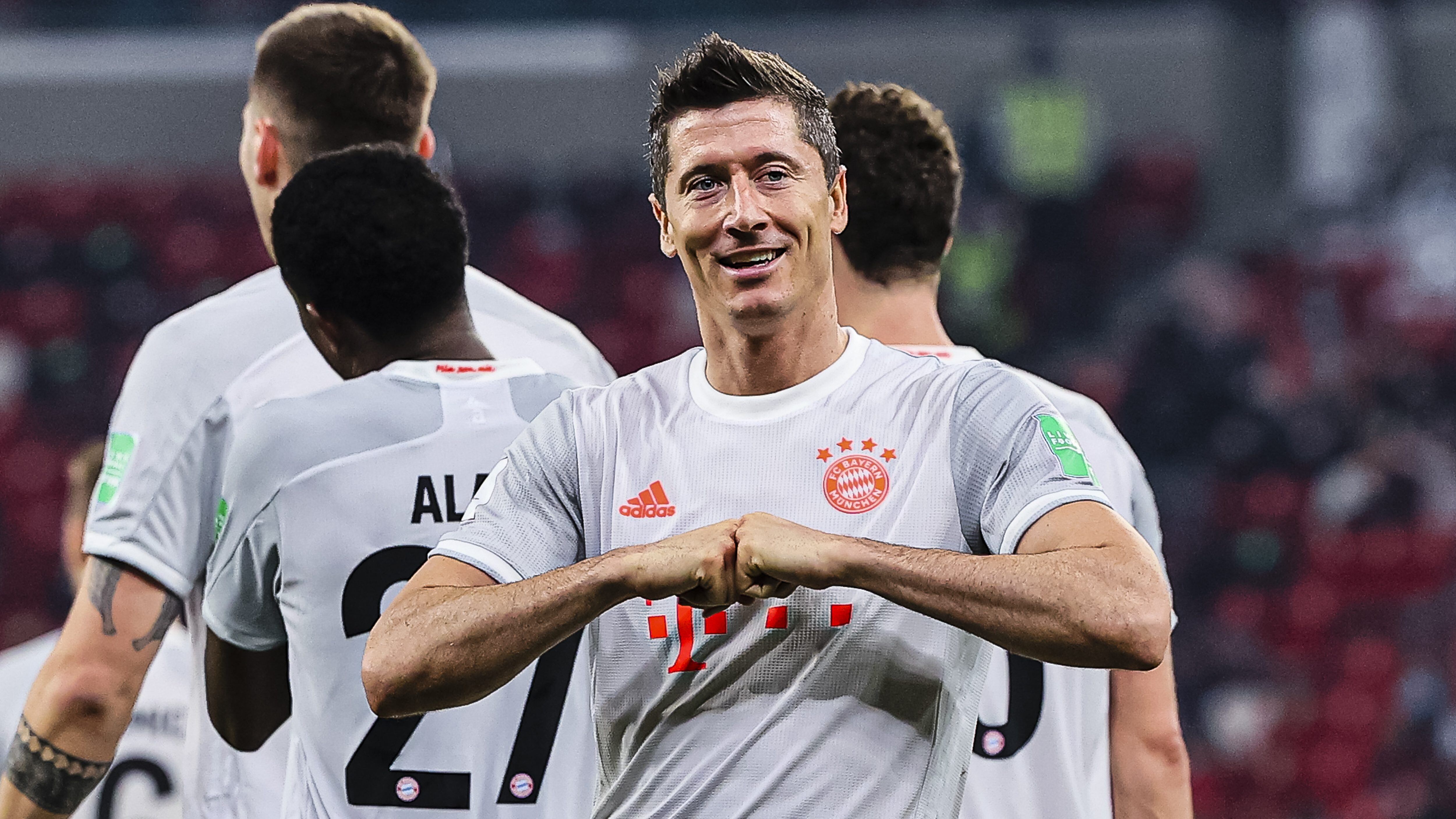 DOHA, QATAR - FEBRUARY 08: Robert Lewandowski of Bayern Munich celebrates his goal with his teammates during the semi-final match between Al Ahly SC and FC Bayern Muenchen at Ahmad Bin Ali Stadium on February 8, 2021 in Doha, Qatar. (Photo by Eurasia Sport Images/Getty Images)