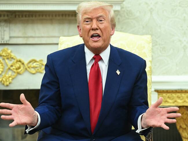TOPSHOT - US President Donald Trump speaks during a meeting with Israeli Prime Minister Benjamin Netanyahu in the Oval Office of the White House in Washington, DC, on April 7, 2025. Israeli Prime Minister Benjamin Netanyahu was in Washington on Monday to meet Donald Trump, whom he will likely ask for a reprieve from US tariffs while seeking further backing on Iran and Gaza. (Photo by SAUL LOEB / AFP) (Photo by SAUL LOEB/AFP via Getty Images)