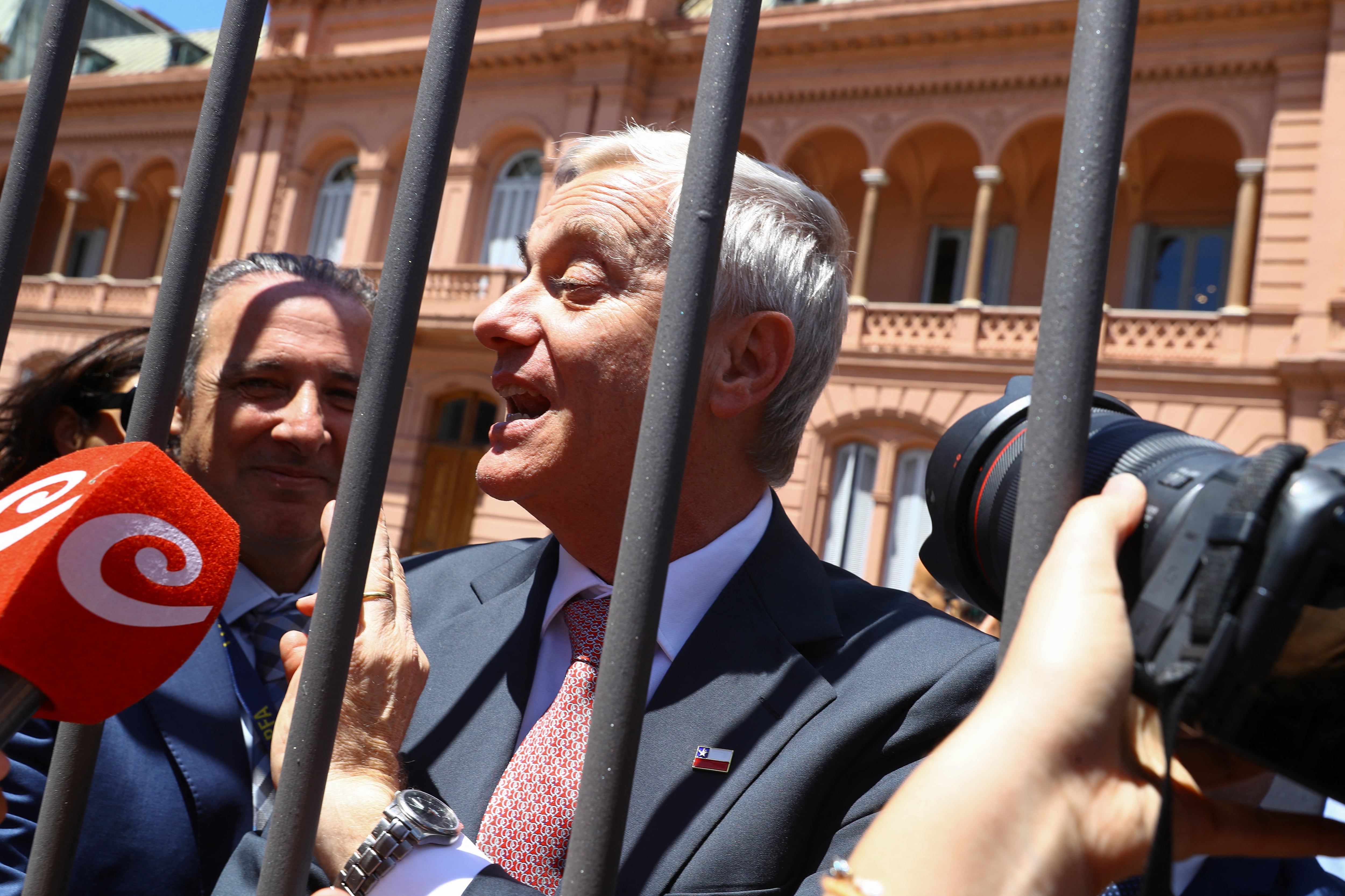 Chile's president-elect Jose Antonio Kast speaks to the press as he leaves the Casa Rosada government palace after meeting Argentina's President Javier Milei, in Buenos Aires, on December 16, 2025. The two right-wing leaders met at the Casa Rosada shortly after midday, according to television images, with no details released by the government. (Photo by ALEJANDRO PAGNI / AFP via Getty Images)