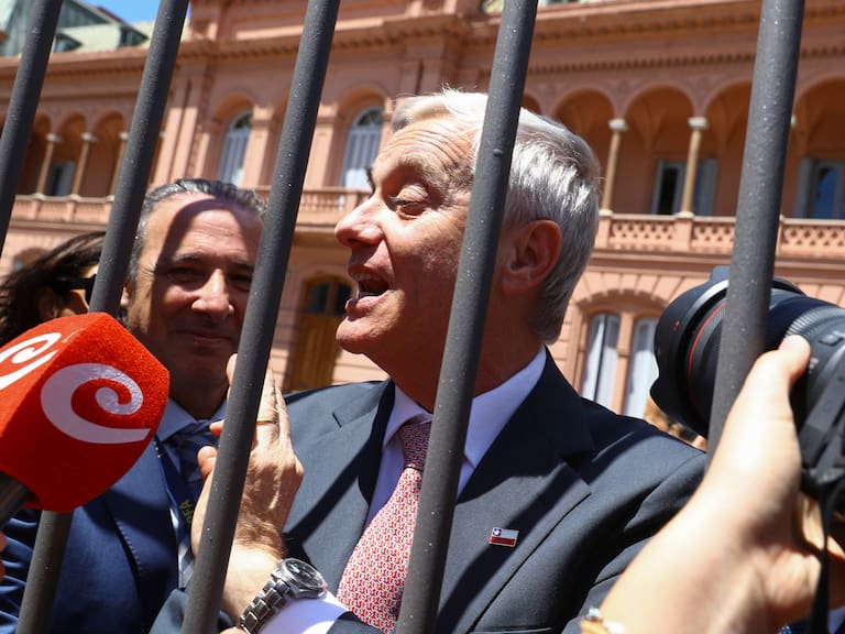 Chile's president-elect Jose Antonio Kast speaks to the press as he leaves the Casa Rosada government palace after meeting Argentina's President Javier Milei, in Buenos Aires, on December 16, 2025. The two right-wing leaders met at the Casa Rosada shortly after midday, according to television images, with no details released by the government. (Photo by ALEJANDRO PAGNI / AFP via Getty Images)