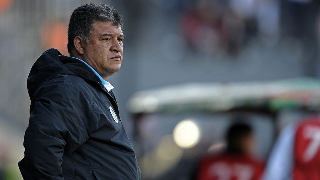 Boca Juniors' team coach Claudio Borghi gestures during their Argentina first division football match against Estudiantes, at Centenario stadium, in Quilmes, Buenos Aires, on September 25, 2010. Estudiantes won 1-0. AFP PHOTO/Alejandro PAGNI (Photo credit should read ALEJANDRO PAGNI/AFP via Getty Images)