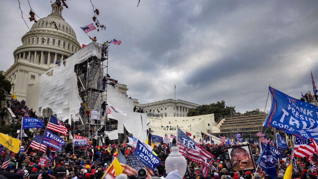 WASHINGTON, DC - JANUARY 6: Trump supporters clash with police and security forces as people try to storm the US Capitol on January 6, 2021 in Washington, DC. Demonstrators breeched security and entered the Capitol as Congress debated the 2020 presidential election Electoral Vote Certification. (photo by Brent Stirton/Getty Images)