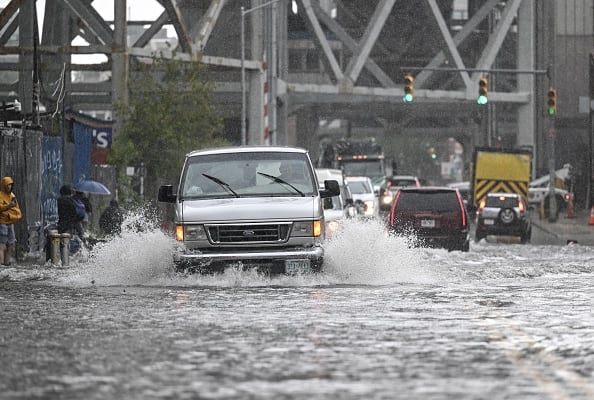 NEW YORK, UNITED STATES - SEPTEMBER 29: Cars struggle in a flooded street in Brooklyn, New York, United States on September 29, 2023. (Photo by Fatih Aktas/Anadolu Agency via Getty Images)