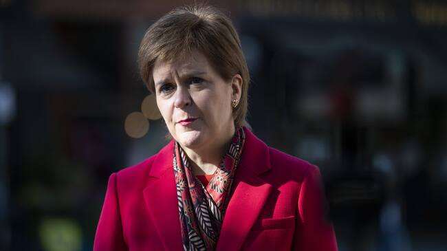 GLASGOW, SCOTLAND - APRIL 02: Scotland's First Minister and leader of the Scottish National Party (SNP) Nicola Sturgeon speaks to the media after visiting the Roots, Fruits and Flowers store in Glasgow's West End on the campaign trail for the forthcoming Scottish Parliamentary Election on April 2, 2021 in Glasgow, Scotland. The Scottish National Party (SNP) is the largest political party in Scotland with 125,691 members and 61 MSPs in the Holyrood parliaments. They stand on a centre-left platform advocating an independent Scotland, nuclear disarmament and social democracy. Scottish voters go to the polls to elect their parliament on May 6, 2021. (Photo by Jane Barlow - Pool/Getty Images)