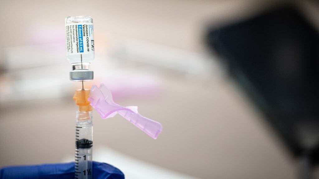 LOUISVILLE, KY - MARCH 15: A syringe with a dose of the Johnson & Johnson COVID-19 vaccine is filled at Wayside Christian Mission on March 15, 2021 in Louisville, Kentucky. Norton Healthcare, in coordination with Metro Louisville and Louisville Public Health and Wellness, held a COVID vaccination event at Wayside Christian Mission for the many people without homes served at that location. (Photo by Jon Cherry/Getty Images)