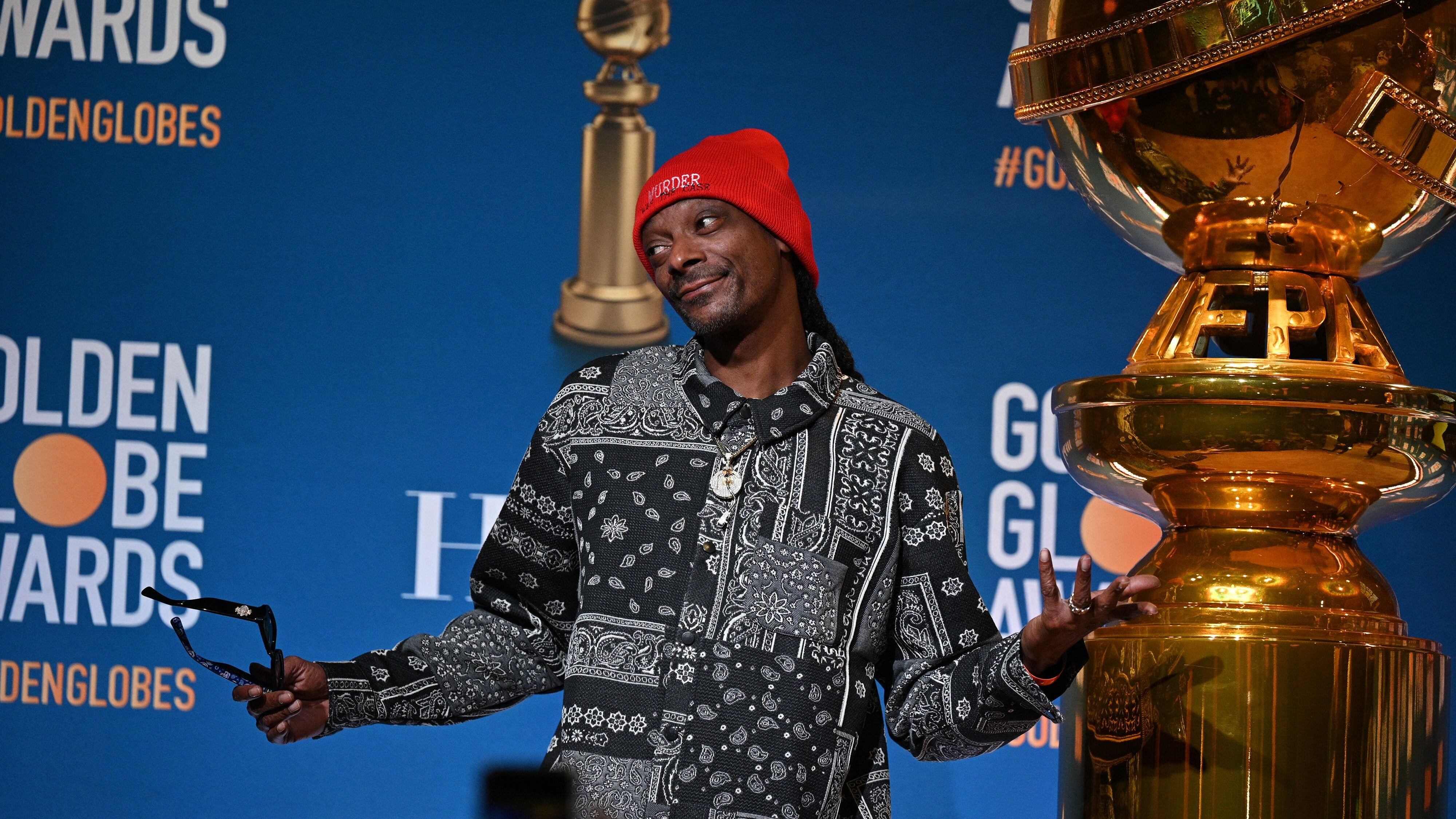 Snoop Dogg attends the nominations announcement for the 79th Golden Globe Awards, December 13, 2021, at the Beverly Hilton Hotel in Beverly Hills, California. (Photo by Robyn Beck / AFP) / The erroneous mention[s] appearing in the metadata of this photo by Robyn Beck has been modified in AFP systems in the following manner: [Snoop Dogg] instead of [Snoop Dog]. Please immediately remove the erroneous mention[s] from all your online services and delete it (them) from your servers. If you have been authorized by AFP to distribute it (them) to third parties, please ensure that the same actions are carried out by them. Failure to promptly comply with these instructions will entail liability on your part for any continued or post notification usage. Therefore we thank you very much for all your attention and prompt action. We are sorry for the inconvenience this notification may cause and remain at your disposal for any further information you may require. (Photo by ROBYN BECK/AFP via Getty Images)