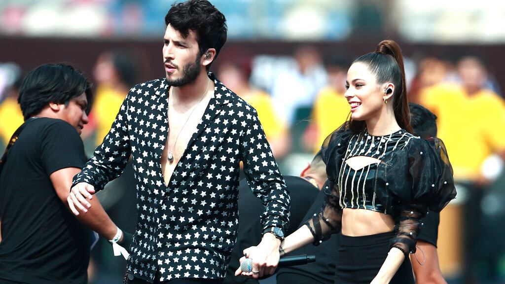 LIMA, PERU - NOVEMBER 23: Sebastian Yatra and Tini Stoessel perform during pre-game show prior to the final match of Copa CONMEBOL Libertadores 2019 between Flamengo and River Plate at Estadio Monumental on November 23, 2019 in Lima, Peru. (Photo by Daniel Apuy/Getty Images)