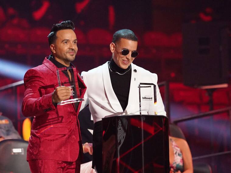 PREMIOS BILLBOARD DE LA MÚSICA LATINA 2020 -- Pictured: Luis Fonsi and Daddy Yankee accept an award on stage at the BB&T Center in Sunrise, FL on October 21, 2020 -- (Photo by: Alexander Tamargo/Telemundo/NBCU Photo Bank via Getty Images)