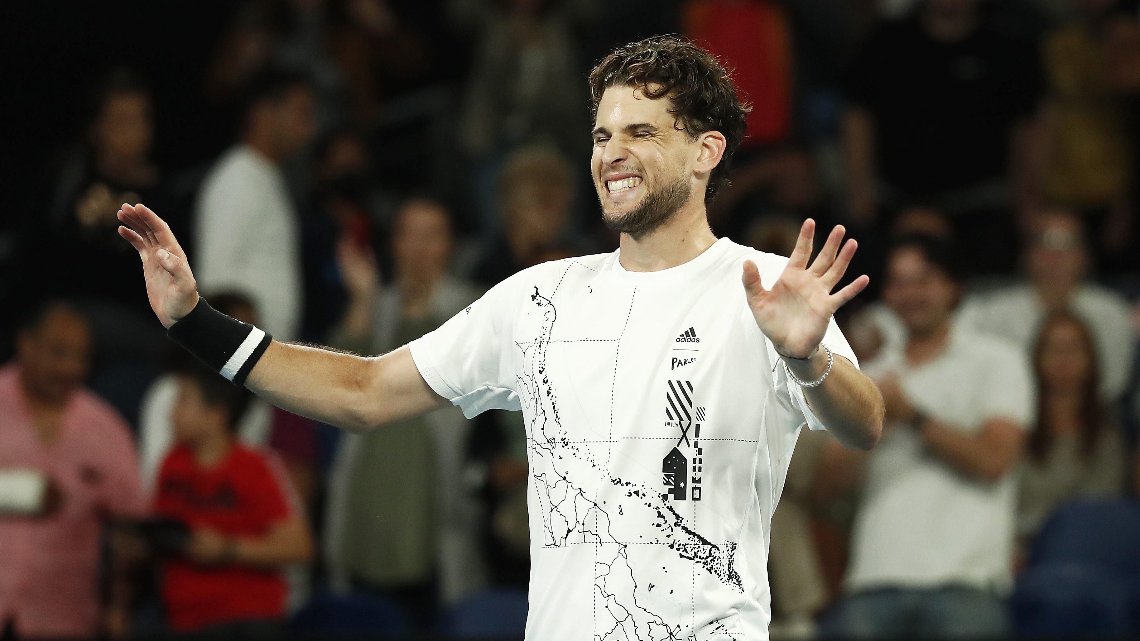 MELBOURNE, AUSTRALIA - FEBRUARY 12:  Dominic Thiem of Austria celebrates after winning his Men's Singles third round match against Nick Kyrgios of Australia during day five of the 2021 Australian Open at Melbourne Park on February 12, 2021 in Melbourne, Australia. (Photo by Daniel Pockett/Getty Images)
