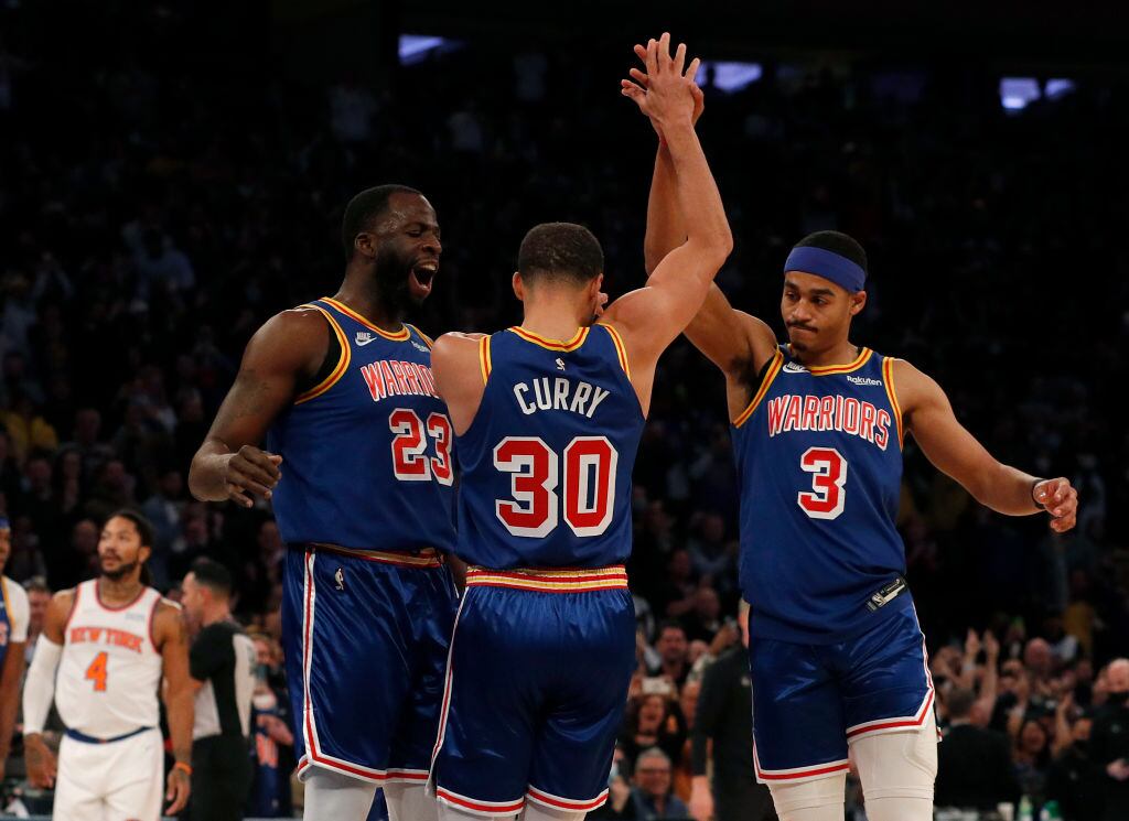 Draymond Green, Stephen Curry y Jordan Poole.