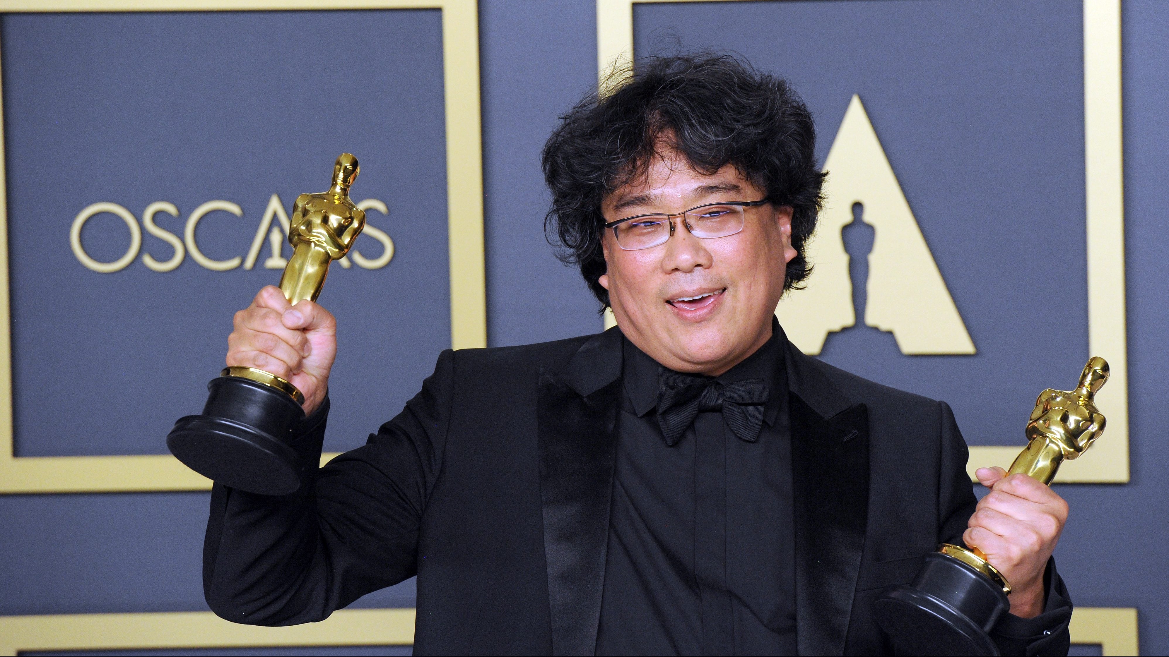 HOLLYWOOD, CA - FEBRUARY 09: Bong Joon Ho poses with his Award for Best Director, Best Picture ('Parasite') inside The Press Room of the 92nd Annual Academy Awards held at Hollywood and Highland on February 9, 2020 in Hollywood, California. (Photo by Albert L. Ortega/Getty Images)