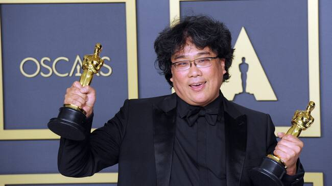 HOLLYWOOD, CA - FEBRUARY 09: Bong Joon Ho poses with his Award for Best Director, Best Picture ('Parasite') inside The Press Room of the 92nd Annual Academy Awards held at Hollywood and Highland on February 9, 2020 in Hollywood, California. (Photo by Albert L. Ortega/Getty Images)