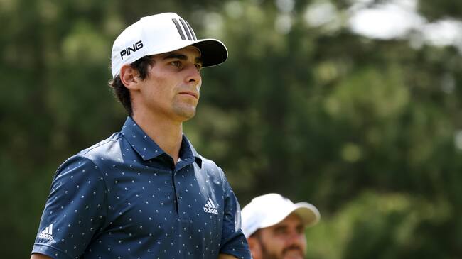 DETROIT, MICHIGAN - JULY 04: Joaquin Niemann of Chile and Troy Merritt prepare to tee off from the fourth tee during the final round of the Rocket Mortgage Classic on July 04, 2021 at the Detroit Golf Club in Detroit, Michigan. (Photo by Gregory Shamus/Getty Images)