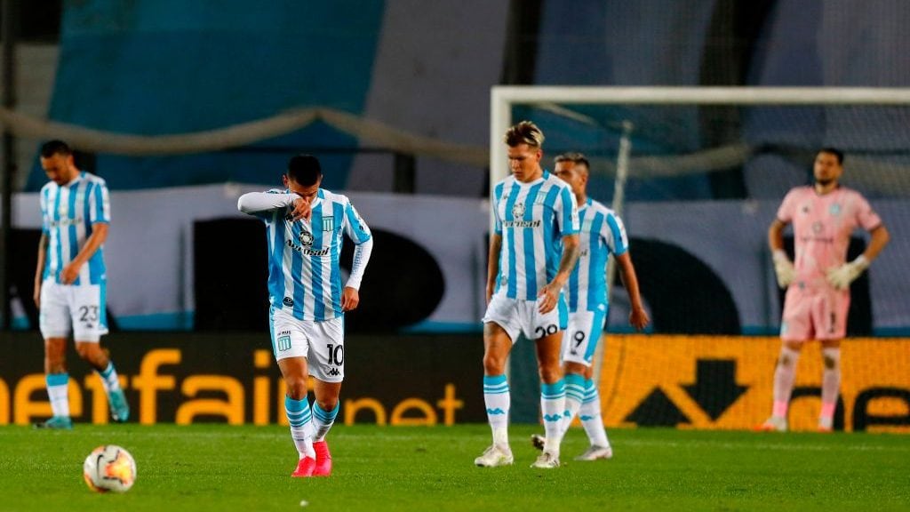 Argentina's Racing players react after Venezuela's Estudiantes de Merida scored during their closed-door Copa Libertadores group phase football match at the Presidente Peron Stadium in Buenos Aires, on October 21, 2020, amid the COVID-19 novel coronavirus pandemic. (Photo by AGUSTIN MARCARIAN / POOL / AFP) (Photo by AGUSTIN MARCARIAN/POOL/AFP via Getty Images)