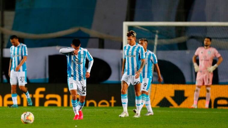 Argentina's Racing players react after Venezuela's Estudiantes de Merida scored during their closed-door Copa Libertadores group phase football match at the Presidente Peron Stadium in Buenos Aires, on October 21, 2020, amid the COVID-19 novel coronavirus pandemic. (Photo by AGUSTIN MARCARIAN / POOL / AFP) (Photo by AGUSTIN MARCARIAN/POOL/AFP via Getty Images)