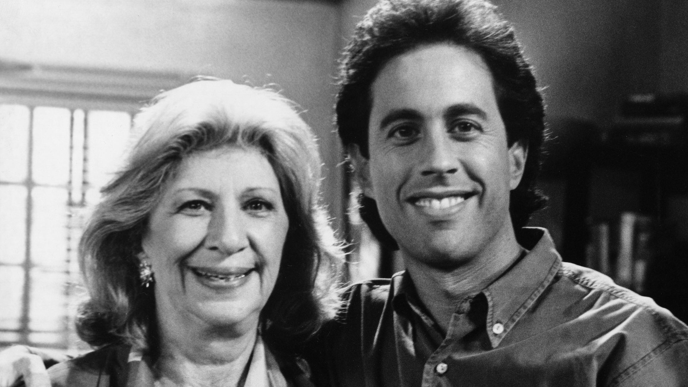 SEINFELD -- Pictured: (l-r) Liz Sheridan as Helen Seinfeld, Jerry Seinfeld as Jerry Seinfeld (Photo by NBCU Photo Bank/NBCUniversal via Getty Images via Getty Images)