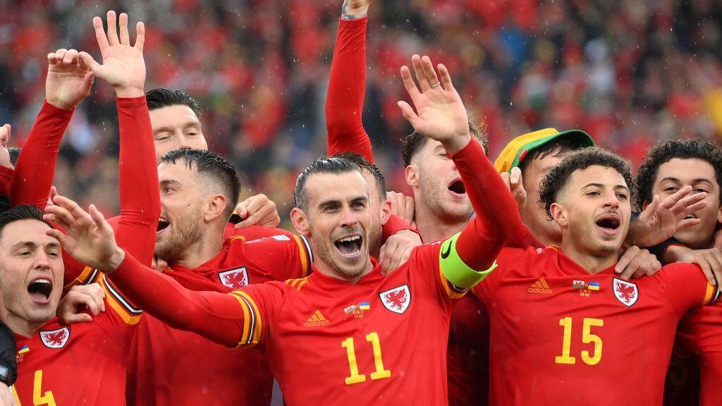 CARDIFF, WALES - JUNE 05: Gareth Bale of Wales celebrates with team mates victory in the FIFA World Cup Qualifier between Wales and Ukraine at Cardiff City Stadium on June 05, 2022 in Cardiff, Wales. (Photo by Shaun Botterill/Getty Images)
