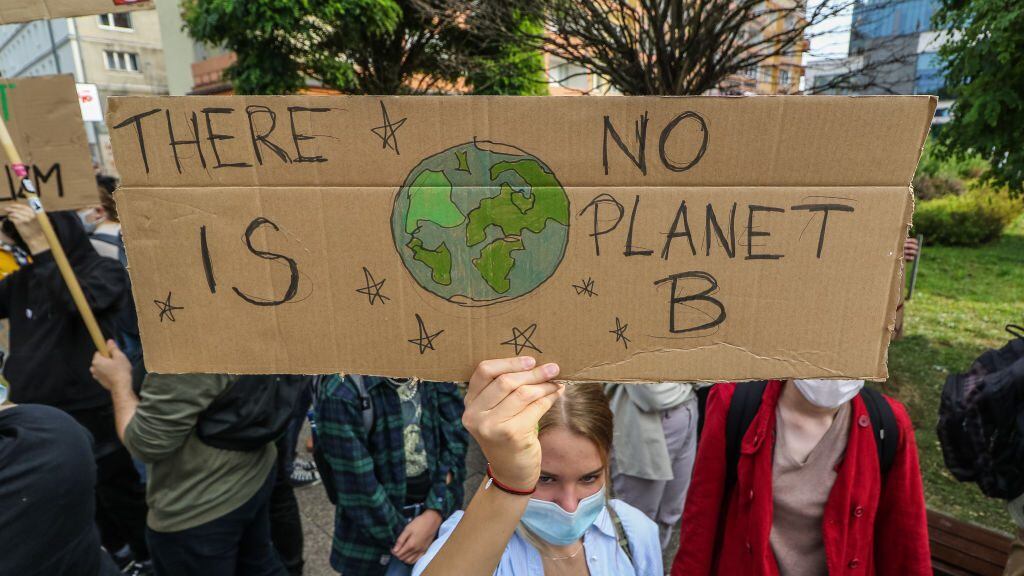 Young protesters with pro-climate banners are seen in Gdansk, Poland, on 25 September 2020 Several hundreds Children and young people wearing face masks due the Covid-19 pandemic, took part in a Global climate strike. They they oppose the passivity of world governments in the face of the climate crisis. (Photo by Michal Fludra/NurPhoto via Getty Images)