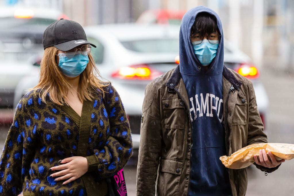 Ciudadanos con mascarillas en Australia