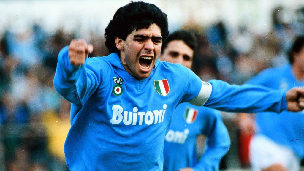 NAPLES, ITALY - MAY 01: Diego Maradona of Napoli celebrates scoring his side's first goal during the Serie A match between Napoli and AC Milan at the Stadio Pao Paulo on May 1, 1988 in Naples, Italy. (Photo by Etsuo Hara/Getty Images)