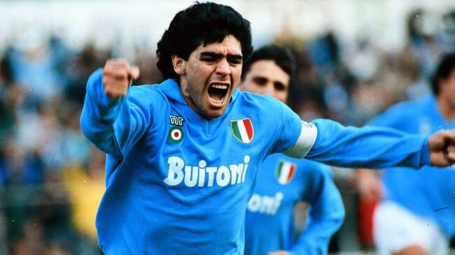 NAPLES, ITALY - MAY 01: Diego Maradona of Napoli celebrates scoring his side's first goal during the Serie A match between Napoli and AC Milan at the Stadio Pao Paulo on May 1, 1988 in Naples, Italy. (Photo by Etsuo Hara/Getty Images)