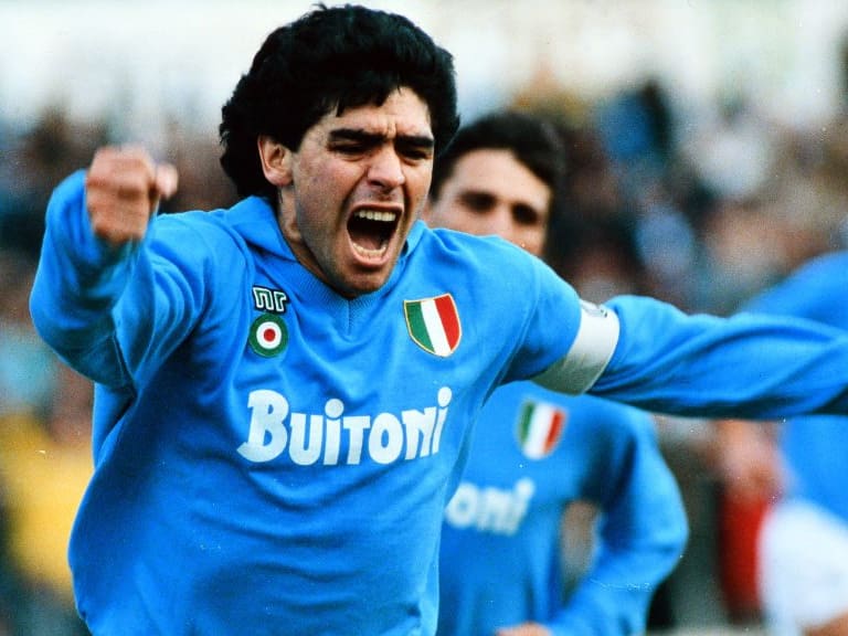 NAPLES, ITALY - MAY 01: Diego Maradona of Napoli celebrates scoring his side&#039;s first goal during the Serie A match between Napoli and AC Milan at the Stadio Pao Paulo on May 1, 1988 in Naples, Italy. (Photo by Etsuo Hara/Getty Images)