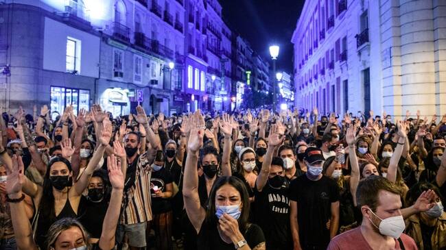 MADRID, SPAIN - JUNE 11: People gather in La Puerta del Sol to protest against "feminicides" on June 11, 2021 in Madrid, Spain. Protestors gathered a day after the Guardia Civil found the lifeless body of six-year-old Olivia, one of the sisters kidnapped by her father Tomas Gimeno on April 27 in Tenerife, in the sea. Currently the security forces continue the search for her sister Anna, just one year old, and the father himself. FEMEN has requested the release of Juana Rivas, imprisoned today in Granada after being sentenced to two years and six months in prison for the abduction of her two minor children in the summer of 2017, when she tried to separate them from their father, claiming that he was victim of abuse. In 2021 there have been 38 murders of women in Spain to date, which is why the activist organization FEMEN has carried out an action in the center of Madrid. (Photo by Joan Amengual/VIEWpress )
